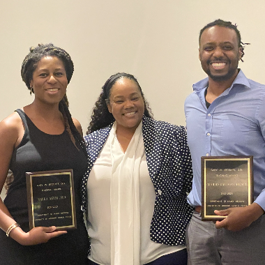 Photo of Nneka Agum MD and Charles Chatman, Jr., MD receiving the Jefcoats Awards from Shannon Pittman MD